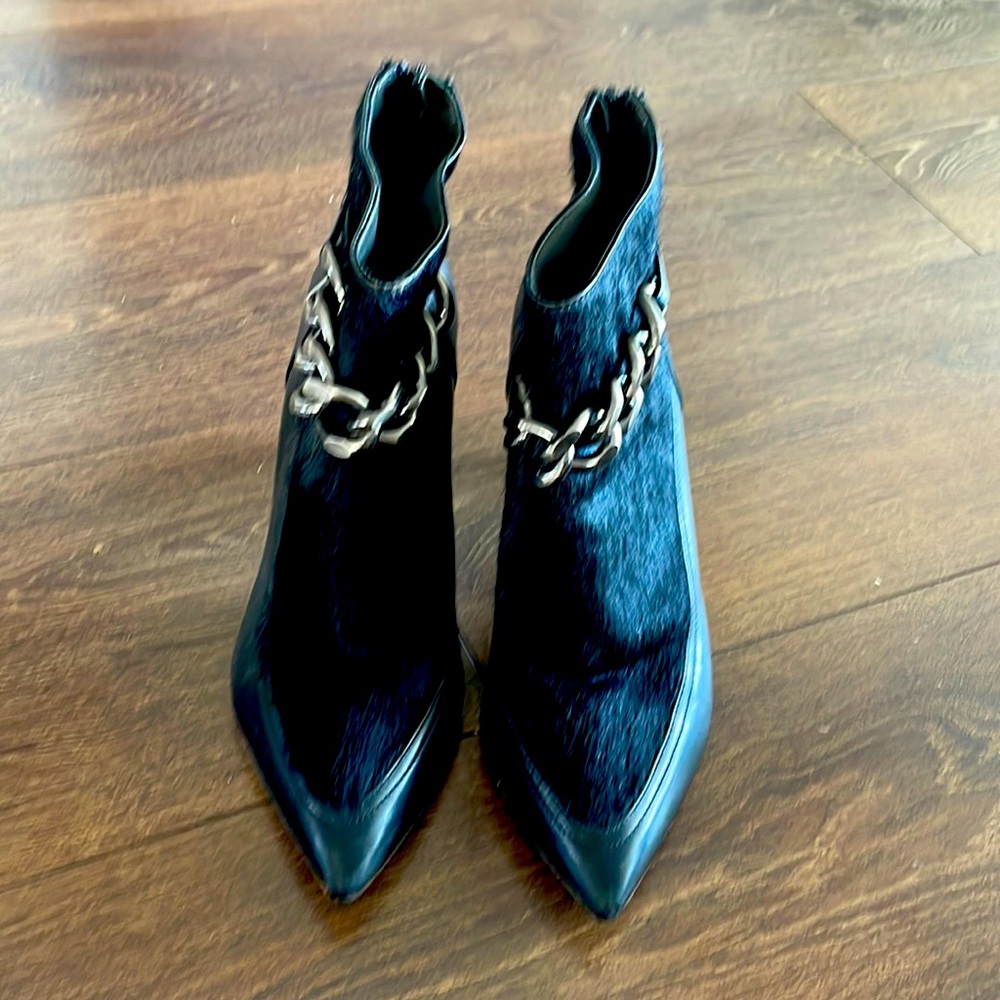 Napoleoni heeled boots for sale.shipping price varies.